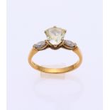 Gold ring with lemon colored diamond