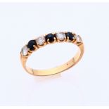 Gold ring with sapphire