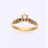 Gold solitaire ring with diamond