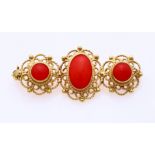 Gold brooch and red coral