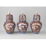 Three Japanese Imari lidded pots, H 37 cm.