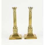 Two brass candlesticks, 1870