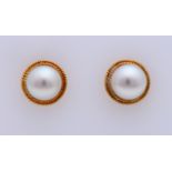 Gold ear studs pearl