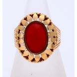 Gold ring with red coral