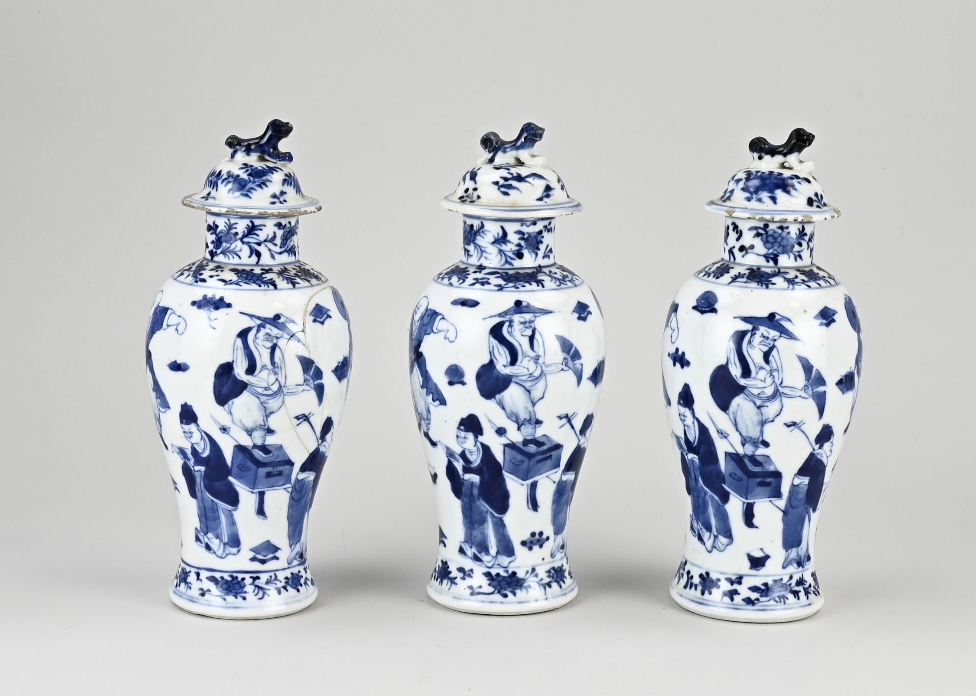 Three 18th - 19th century Chinese lidded vases, H 23 cm.