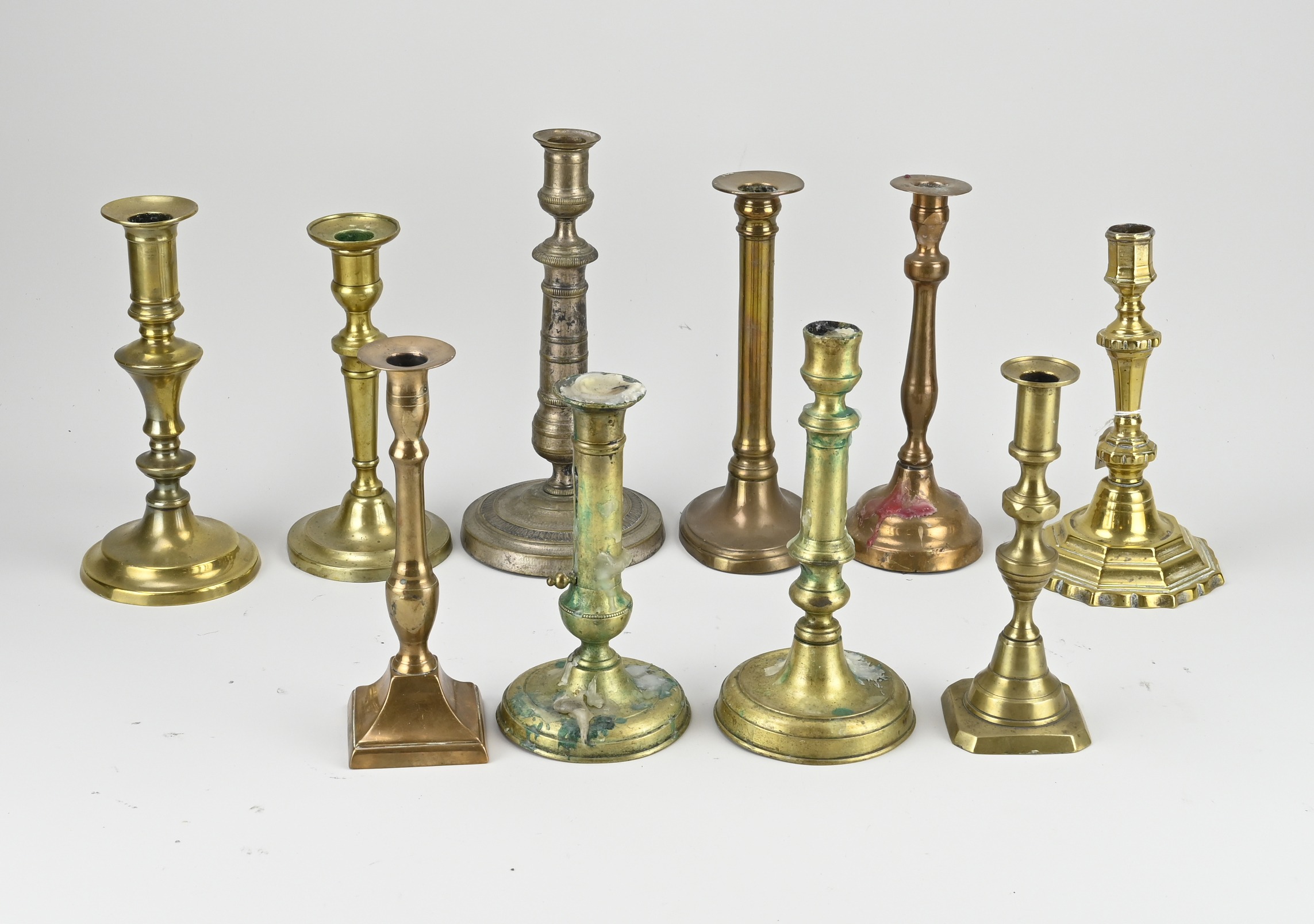 Lot of antique candlesticks (10 x)