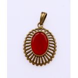 Gold pendant with carnelian