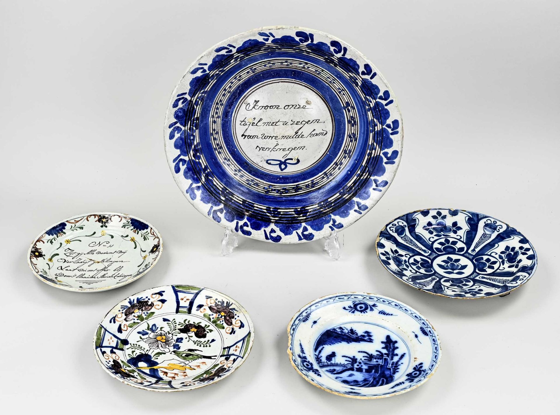 Five 18th century Dutch plates Ø 22 - 38 cm.