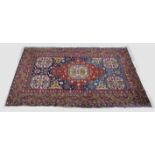 Persian rug, 210 x 125 cm.