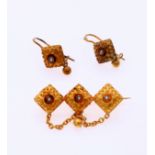 Gold earrings and brooch