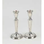 Two silver candlesticks