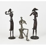 Three bronze figures