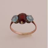 Gold ring blue stone/garnet
