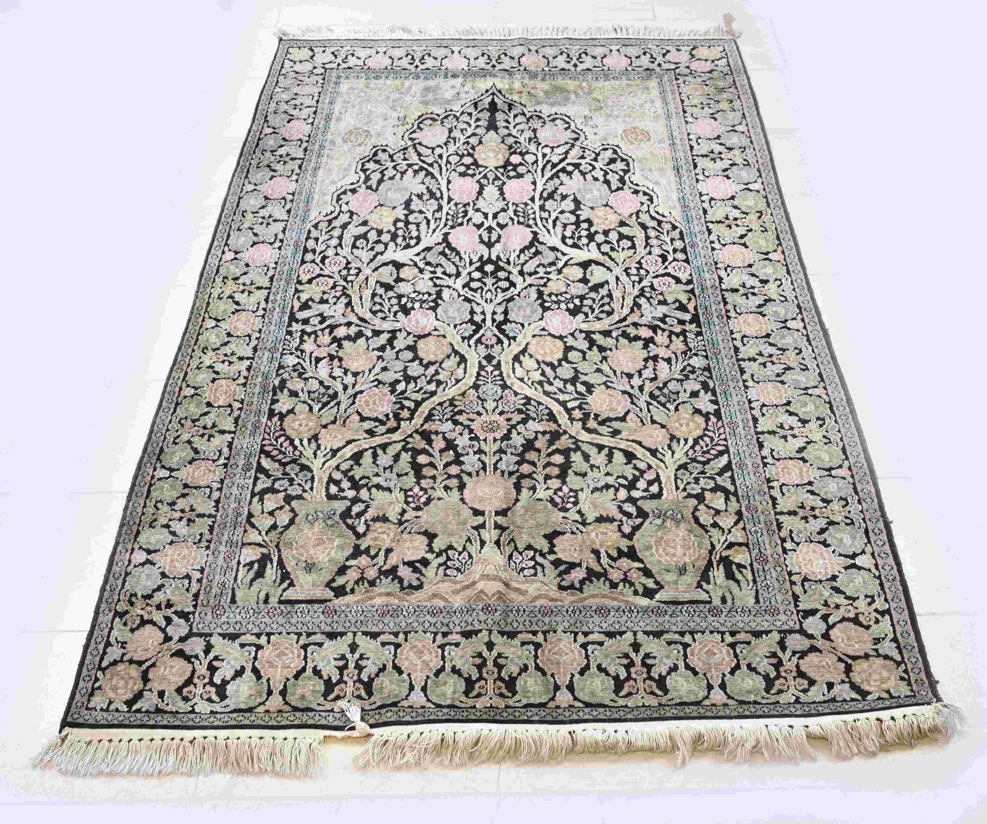 Hand-knotted silk rug, 223 x 140 cm.