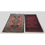 Two Persian rugs, 155 x 92 cm. / 160 x 110 cm.
