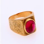 Gold pinky ring with ruby