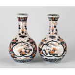 Two 18th century Imari jar vases, H 23 cm.