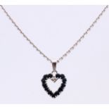 White gold necklace with heart pendant with sapphire