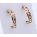 Gold earrings with zirconia