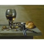 C. Cornelisz , Still life with Roemer, bread, walnut etc.