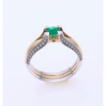 Gold ring emerald and diamond