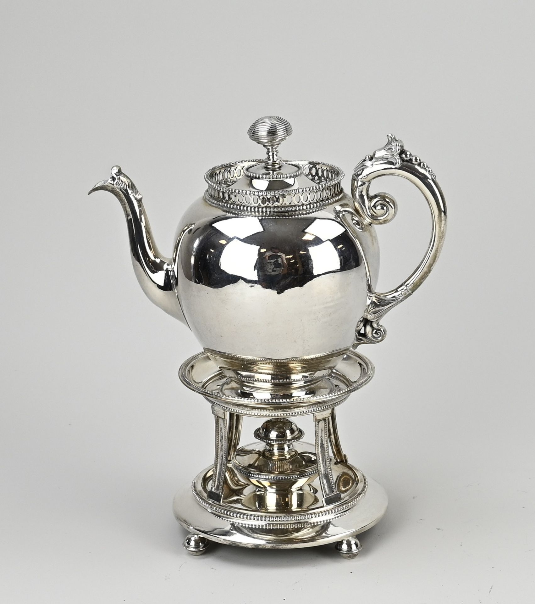 Silver pitcher with stove