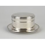 Silver drum with saucer