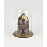 Antique painted wooden egg under a bell jar, 1900