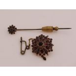 Two gold brooches