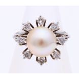 White gold pearl ring with diamond