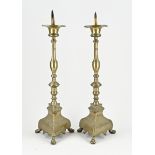 Two bronze ecclesiastical candlesticks, H 65 cm.