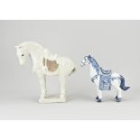 Two old porcelain horses