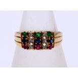 Gold ring with sapphire emerald and ruby