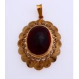 gold garnet pendant