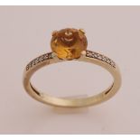 Gold ring with citrine and diamond