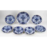 Seven antique Delft peacock plates, 1880