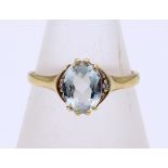 Gold ring blue topaz and diamond