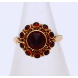 Gold ring with garnet