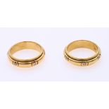 Set of gold rings with diamonds