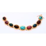 Gold bracelet with gemstones