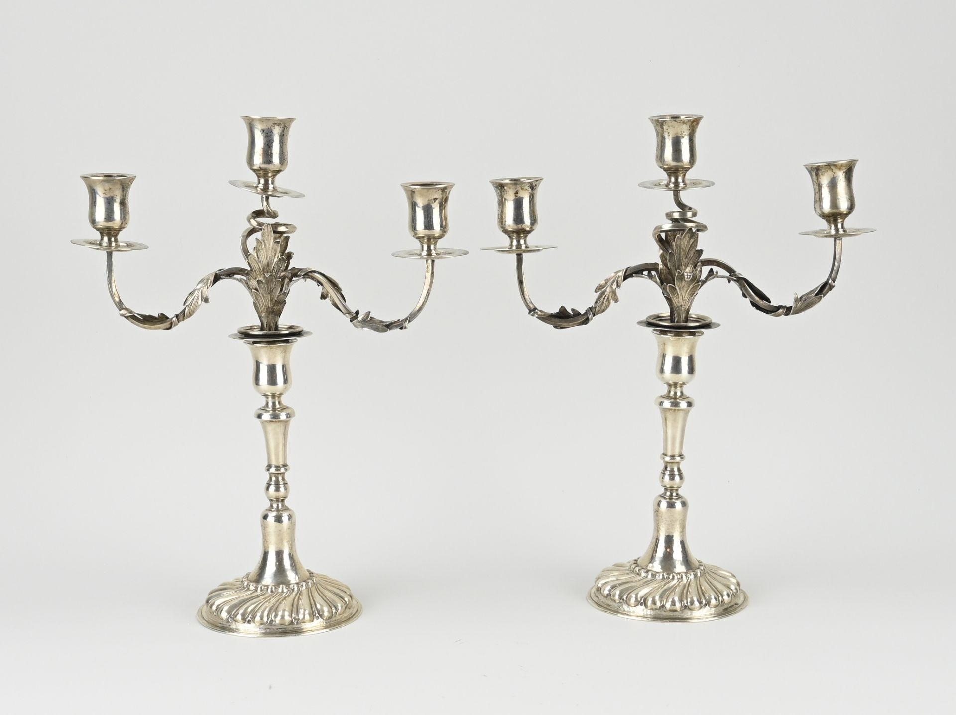 Two silver candlesticks