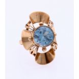 Gold ring with blue stone