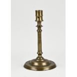 17th century bronze candlestick, H 23 cm.