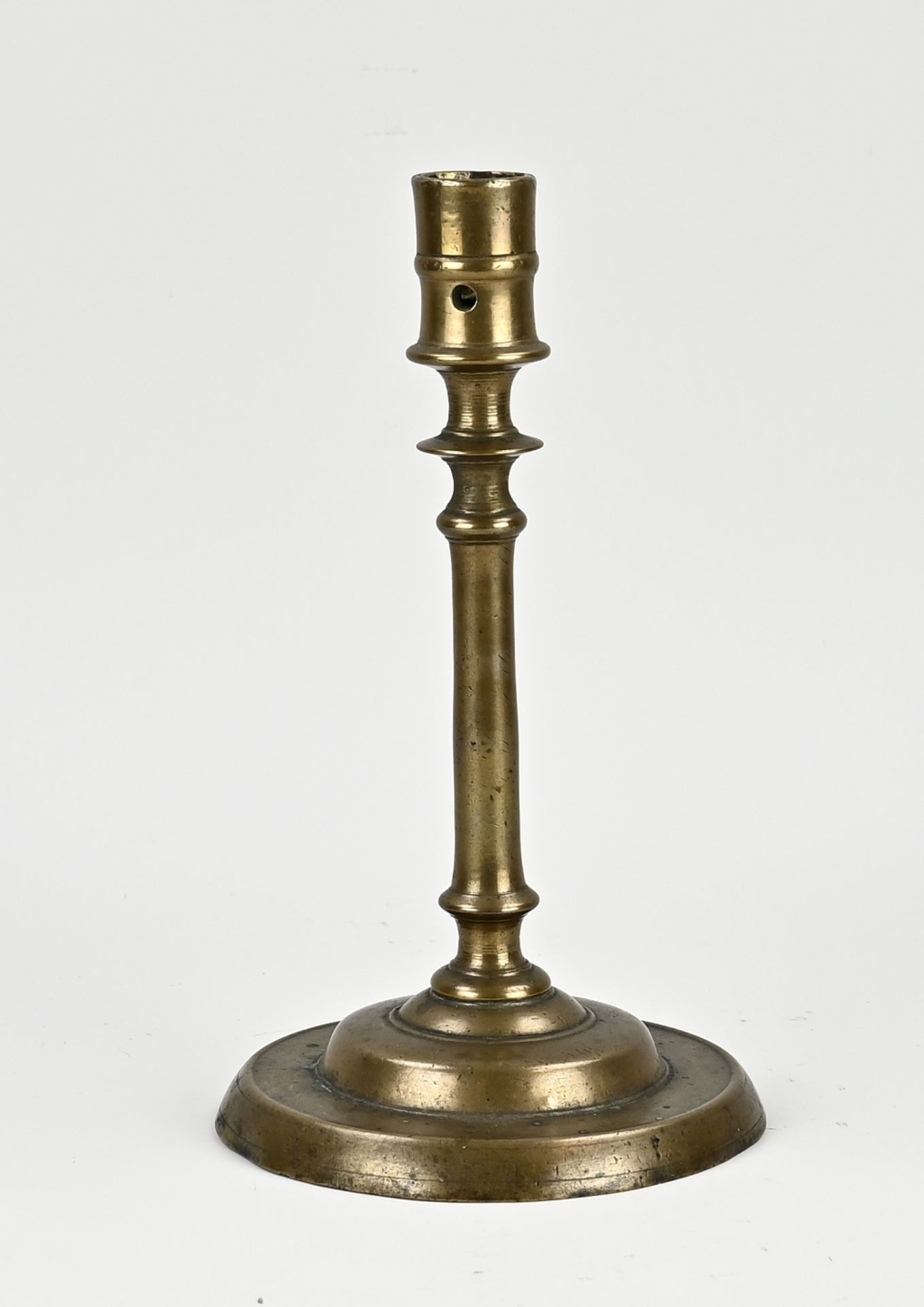 17th century bronze candlestick, H 23 cm.