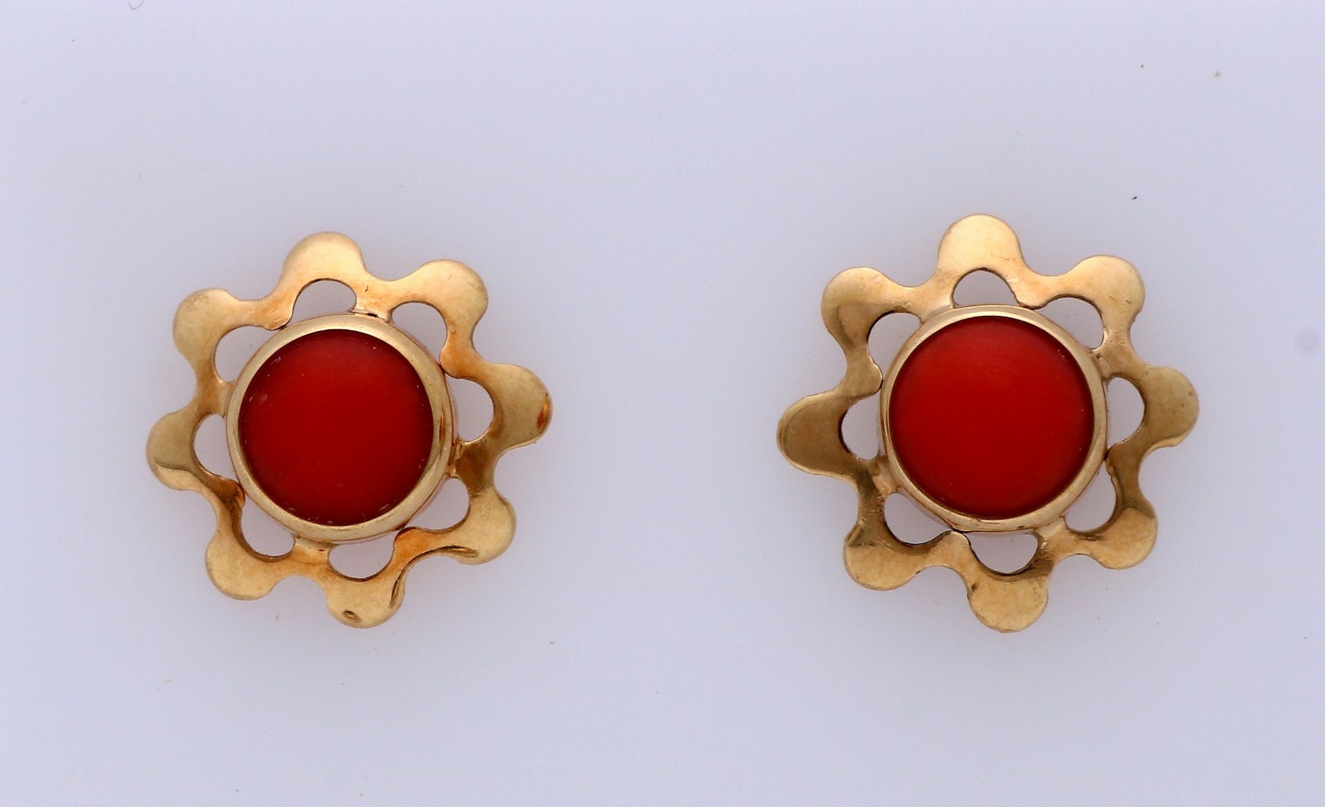 Gold ear studs with red coral