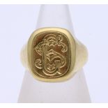 Gold ring with monogram