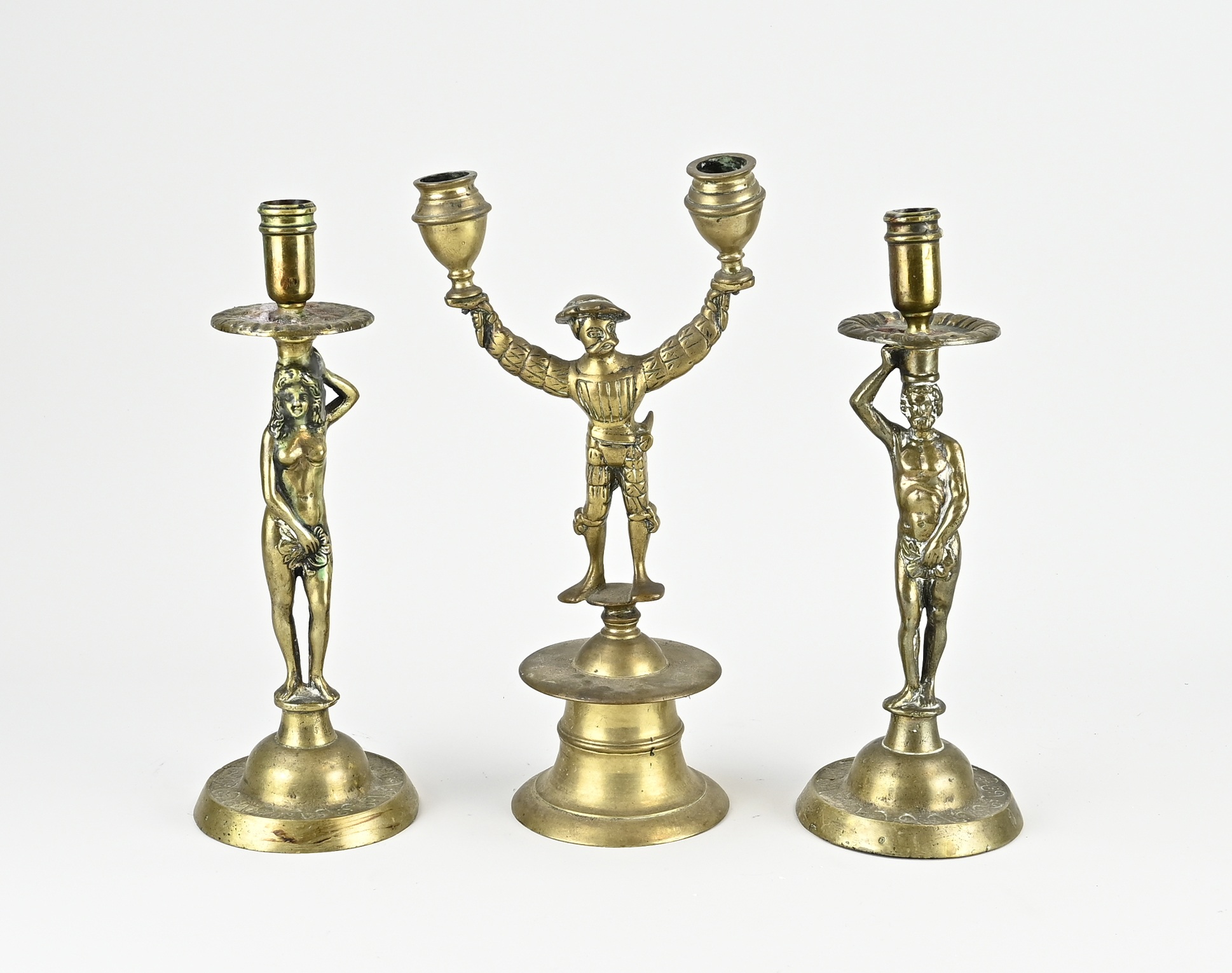 Three antique candlesticks, 1900