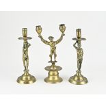 Three antique candlesticks, 1900