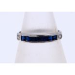 White gold ring with sapphire and diamond