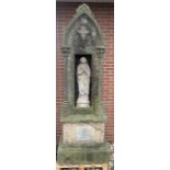 Antique Gothic sandstone chapel with statue
